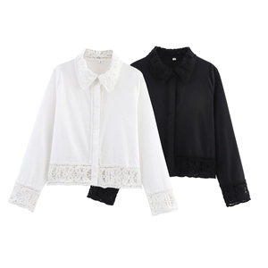 Detailed view of black and white crochet shirts with intricate floral lace trim and collar
