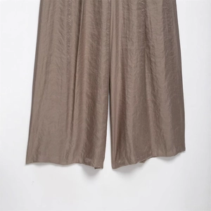Women's elegant high waist wide leg satin trousers with belt in taupe metallic finish