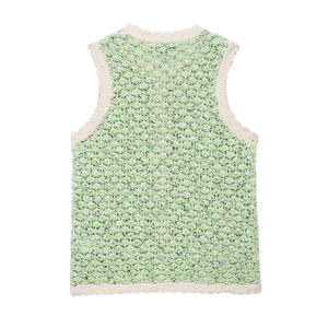 Women's green and cream textured knit top with hollow crochet and wavy scalloped edges