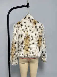 Detail view of the back of a faux fur leopard print jacket with fluffy spotted texture