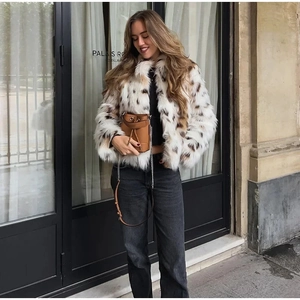 Short faux fur leopard print coat for women featuring a fluffy texture and long sleeves