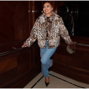 Faux fur leopard print jacket with turn-down collar paired with straight jeans and heels