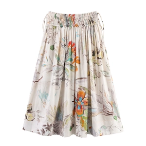 Detail of high waist floral midi skirt showing elastic waistband and drawstring ties
