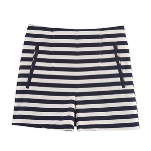 Detail view of high waisted A-line shorts featuring classic blue and white stripes and pockets