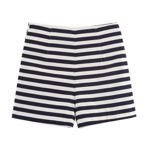 Detail view of high waisted black and white striped shorts with smooth flat waistline