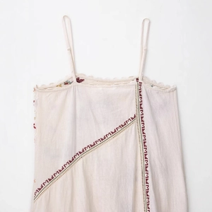 Off-white embroidered dress with thin straps and geometric floral patterns for women