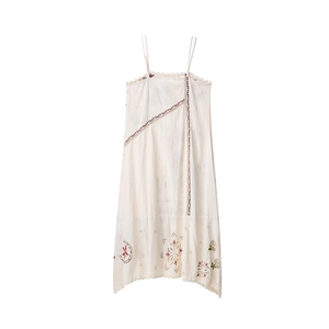 White bohemian maxi dress with red embroidery and asymmetrical lace hemline