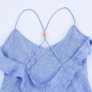 Light blue tiered strappy dress with ruffles and open back detail for early spring