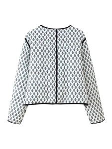 Back view of a white quilted jacket featuring vintage black leaf prints and contrast piping