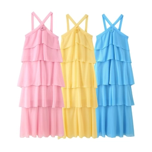 Three-color layered chiffon maxi dress with halter neck and 3D floral accents