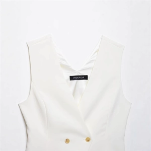 Women's white V-neck double-breasted vest top with amber buttons and tailored texture