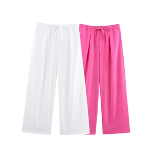 Pantalon large en lin blanc et rose fuchsia avec taille élastique à cordon et plis devant