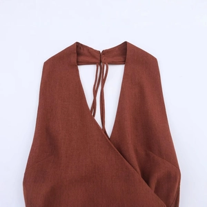 Rust red halter midi dress in linen blend featuring a crossover neckline and back tie detail