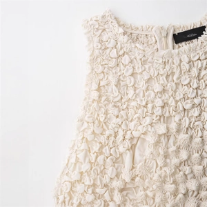 Off-white sleeveless dress with 3D popcorn texture fabric and hidden back zipper