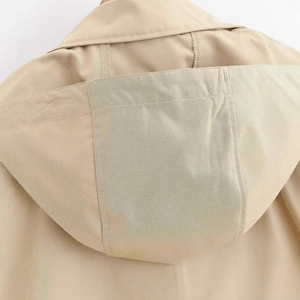 Back view of a khaki hooded jacket for women with premium stitching and woven texture