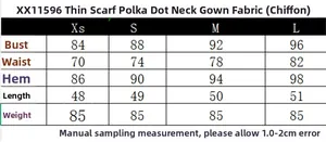 Detailed size chart for polka dot halter top showing chest and waist measurements in cm