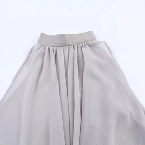 Elegant light gray pleated top for women featuring a stylish halter neck and elastic waist