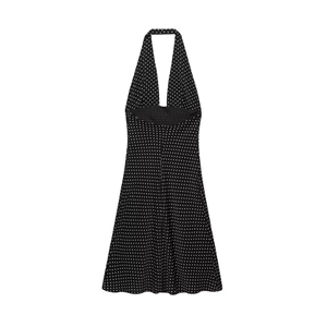 Retro black and white polka dot halter neck dress with backless A-line silhouette