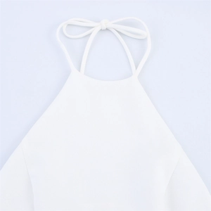 White halter neck dress with bow tie detail and minimalist sleeveless design