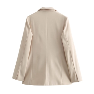 Rear view of light apricot long-sleeve blazer showing seam detail and tailored cut