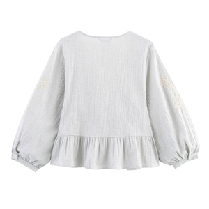 Elegant long sleeve embroidered blouse with peplum hem in light grey cotton linen fabric