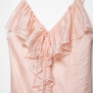 Pink V-neck pleated camisole dress with layered ruffle detailing and center drawstring