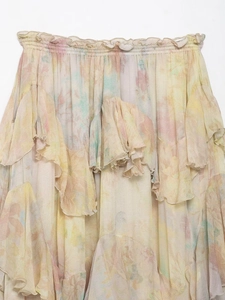 Detail of high waist tiered ruffle skirt featuring pastel floral watercolor prints