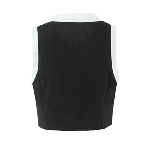 Back view of a sleeveless black vest with white contrast trim and cotton blend fabric