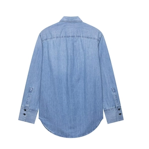 Relaxed fit light blue denim shirt for women with classic back yoke and curved hem
