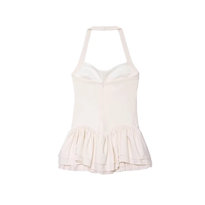 Sleeveless backless halter dress in beige with tiered ruffled hem and hidden back zipper