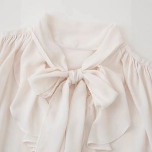 Elegant ruffled collar blouse with large bow tie in creamy chiffon for women
