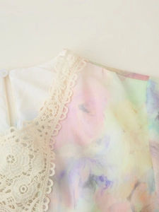 Detail of lace-trimmed neckline and tie-dye floral chiffon dress with back button