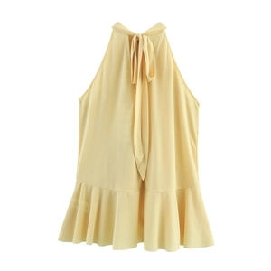 Detail of light yellow halter top featuring a back bow tie and pleated ruffled hemline