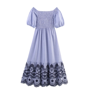 Blue striped smocked maxi dress with puff sleeves and black floral embroidery