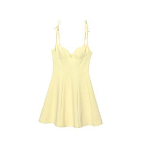 Mini yellow sundress with bow tie straps and sweetheart neckline in A-line silhouette