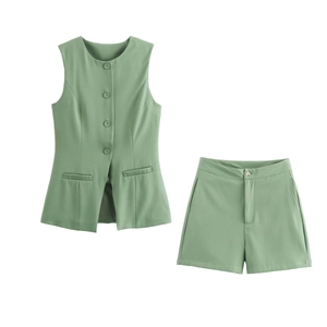 Flat lay of sage green two-piece set featuring sleeveless vest and high waist shorts