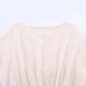 Close-up of lightweight light pink sheer blouse featuring a minimalist round neckline