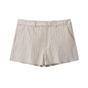 Women's French style beige high-waist casual shorts with textured vertical fabric
