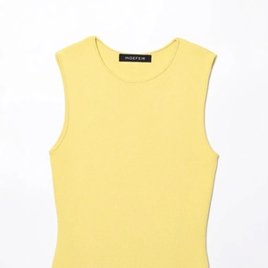 Haut en tricot sans manches pour femme jaune clair minimaliste avec une texture douce