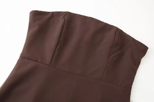 Detail view of coffee brown strapless dress with vertical darts for textured fit