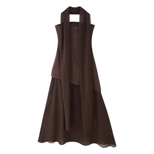 Detail view of the elegant layered chiffon halter neck dress with sash in dark brown