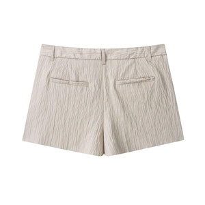 Rear view of beige textured shorts featuring precise back welt pockets and waist belt loops