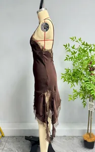 Detail view of the coffee satin dress featuring intricate lace trim and asymmetrical hemline