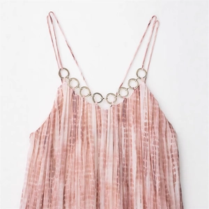 Pink and brown tie-dye pleated mini dress featuring a stylish metal ring chain neckline