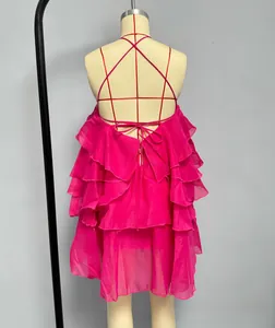 Detailed back view of a rose red ruffled mini dress with elegant cross-tie straps