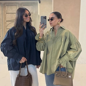 Oversized loose lantern sleeve shirt with ruffled cuffs in black and olive green
