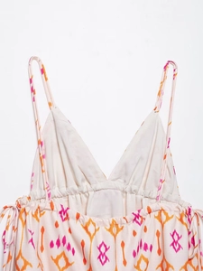 Detail of V-neck camisole with ethnic ikat print and delicate sequin embroidery accents