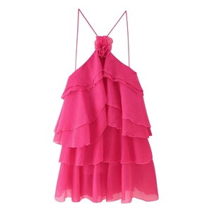Hot pink halter neck mini dress featuring layered ruffles and a 3D floral accent