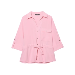 Detail of pink safari-style shirt with lapel collar, chest pocket and waist tie belt
