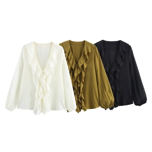 Detail of V-neck chiffon blouses with layered ruffles in white, olive green, and black
